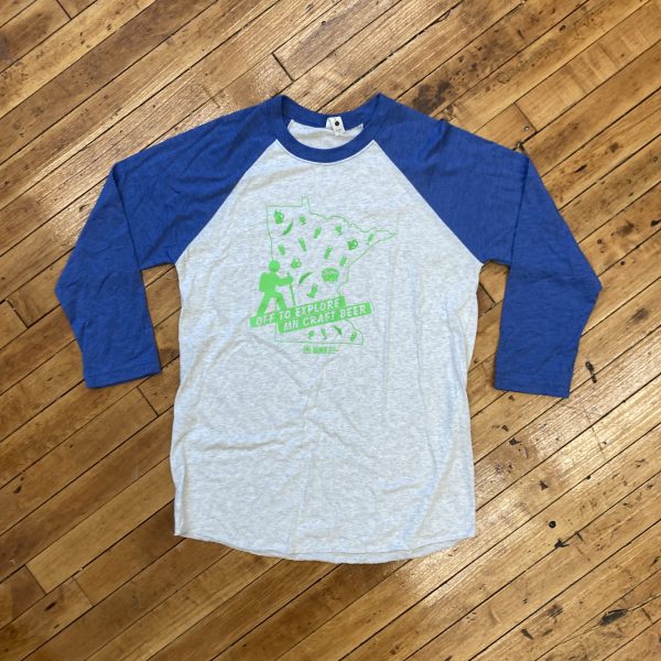 Heather white/gray shirt with royal blue collar and sleeves. Green design says "Off to explore MN craft beer" with icons of a hiker and beer icons throughout the MN state outline.
